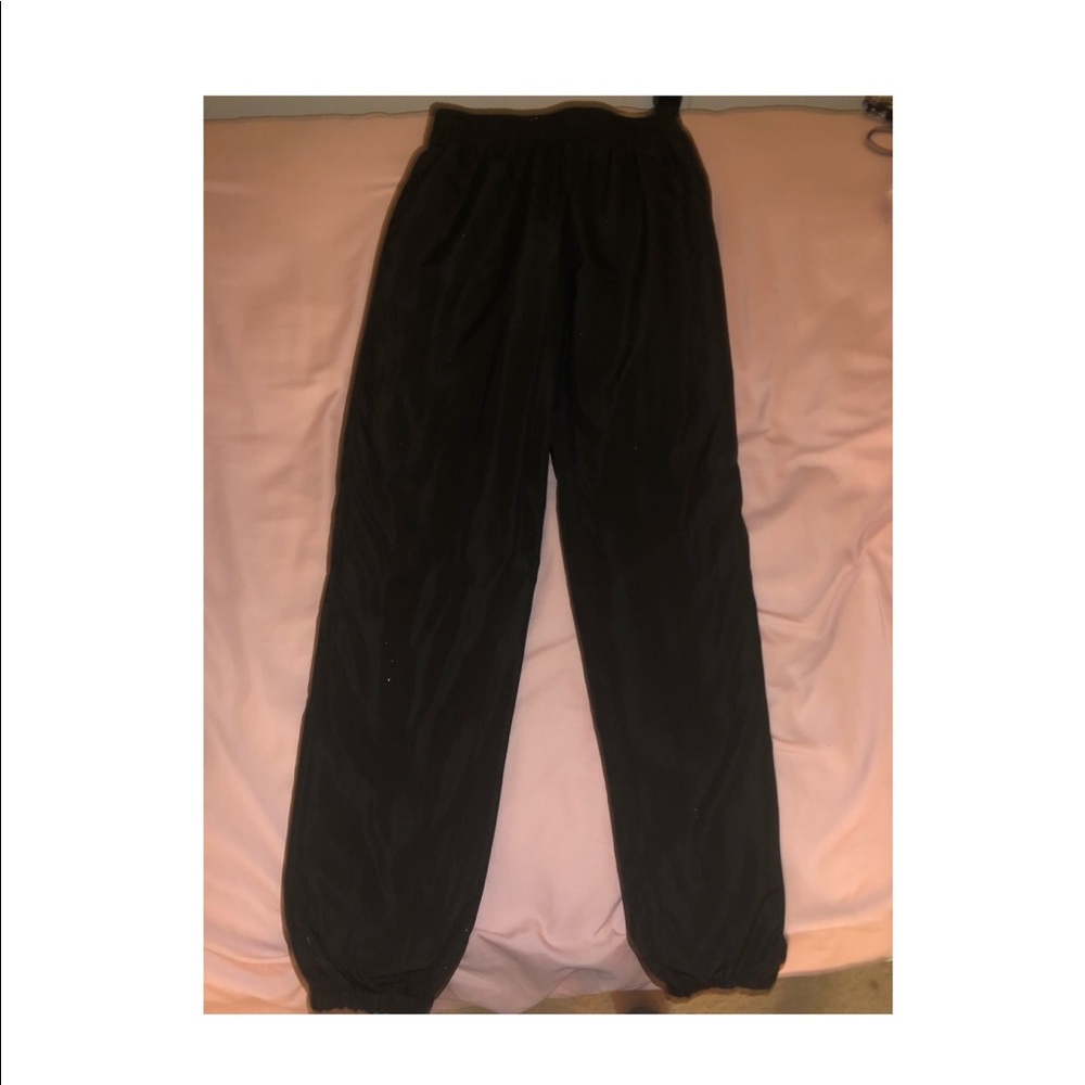 Fashion Nova black windbreaker pants